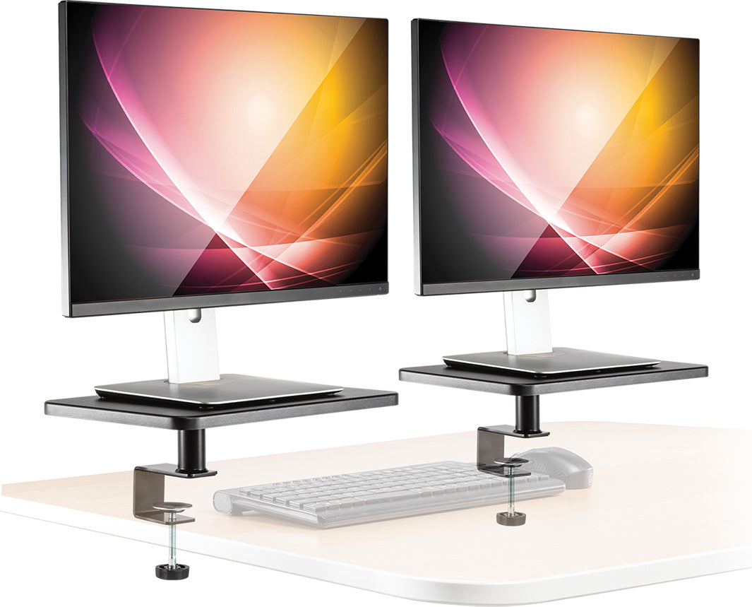 Isolated studio image of two Ascend monitor stands and monitors attached to a transparent desk.